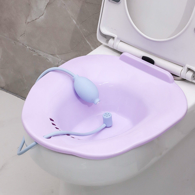 Laver le vagin et cuire à la vapeur avec un siège en plastique pour toilettes